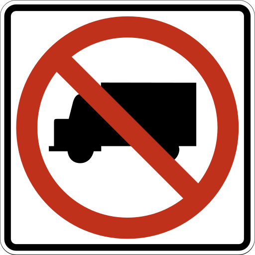 A white square sign with a black truck seen from the side, under a red circle and a red diagonal slash.