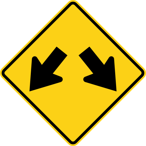 A yellow diamond sign shows two separate black arrows: one points down and to the left, and the other points down and to the right.