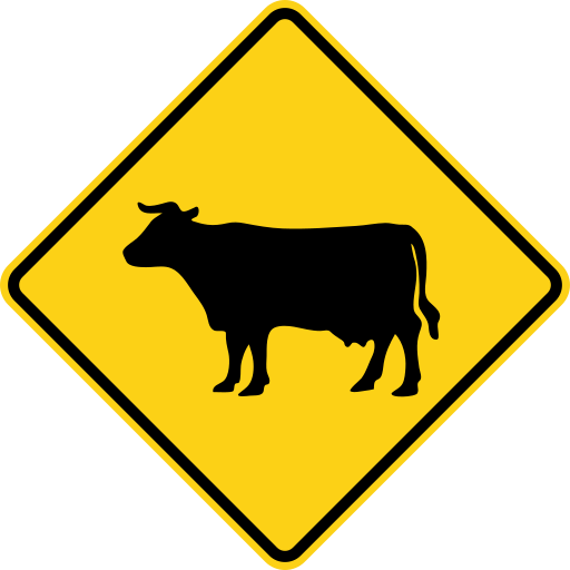 Yellow diamond sign with a black border and a black side view of a cow.