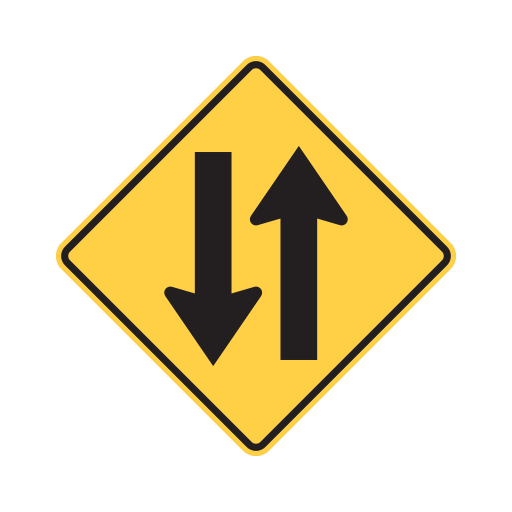 A yellow diamond sign with two black arrows side by side, one that points up and one that points down.